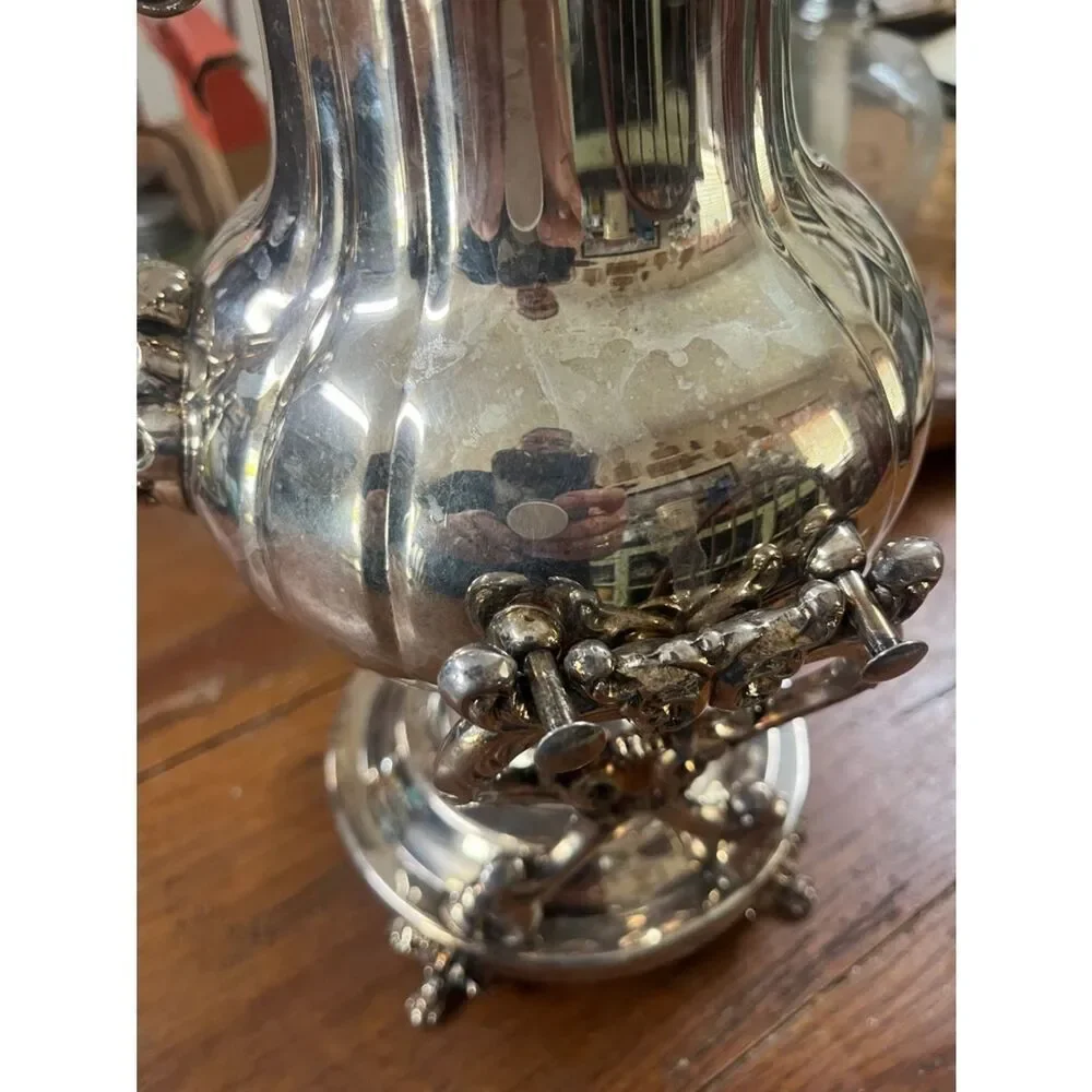 Towle tilting teapot